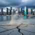 “Vancouver skyline at dusk with subtle ground cracking and faint dust at the waterfront promenade, suggesting seismic shaking.”